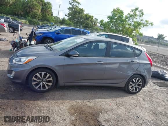 ✅ 2015 Hyundai Accent Sport • VIN: KMHCU5AE1FU217997 • Lot: 42459613. Listed on IAAI with 114,349 mi miles. Access the free auction sales archive from the USA and view a detailed vehicle history report at DreamBid. Image 14.