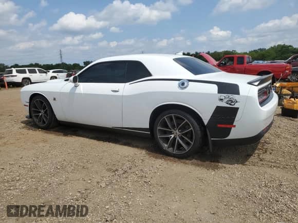 2018 Dodge Challenger T/A 392 with VIN 2C3CDZFJ4JH215243, listed as a Copart auction lot 67545415 with 64,785 mi miles and Salvage title. Bid and sale history available at DreamBid. Image 2.