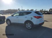 ✅ 2014 Hyundai Santa Fe • VIN: 5XYZU3LA1EG161122 • Lot: 93245155. Listed on Copart with 179,433 mi. Free auction sales archive from the USA and detailed vehicle history report at DreamBid. Image 2.