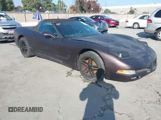 ✅ 2001 Chevrolet Corvette • VIN: 1G1YY32G915117922 • Lot: 43833203. Listed on IAAI with 128,921 mi. Free auction sales archive from the USA and detailed vehicle history report at DreamBid. Image 1.