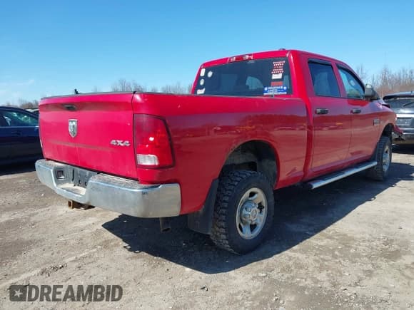 ✅ 2012 Ram 2500 ST • VIN: 3C6TD5CT6CG200358 • Lot: 41806692. Listed on IAAI with 143,390 mi. Free auction sales archive from the USA and detailed vehicle history report at DreamBid. Image 4.