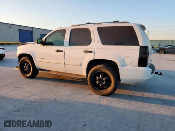 2007 Chevrolet Tahoe LS with VIN 1GNFC13C17R354832, listed as a Copart auction lot 82367185 with 234,396 mi miles and Salvage title. Bid and sale history available at DreamBid. Image 2.