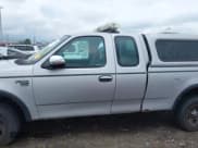✅ 2002 Ford F-150 XL • VIN: 1FTRX18L52NB18963 • Lot: 42042014. Wystawiony na IAAI z przebiegiem 229 262 mil. Bezpłatny archiwum sprzedaży aukcyjnych z USA i szczegółowy raport historii pojazdu na DreamBid. Zdjęcie 14.