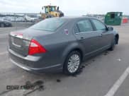 ✅ 2011 Ford Fusion Hybrid • VIN: 3FADP0L33BR116627 • Lot: 43911282. Listed on IAAI with 147,176 mi. Free auction sales archive from the USA and detailed vehicle history report at DreamBid. Image 4.