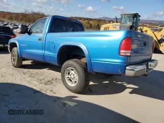 1999 Dodge Dakota with VIN 1B7GG26Y1XS221141, listed as a Copart auction lot 78721304 with 195,896 mi miles and Salvage title. Bid and sale history available at DreamBid. Image 2.