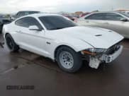 ✅ 2020 Ford Mustang GT • VIN: 1FA6P8CF8L5173461 • Lot: 43496554. Listed on IAAI with 33,679 mi. Free auction sales archive from the USA and detailed vehicle history report at DreamBid. Image 1.