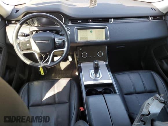 ✅ 2021 Land Rover Range Rover Evoque S • VIN: SALZJ2FX4MH138323 • Лот: 82505075. Опубликован ранее на Copart с пробегом 53 210 миль. Бесплатный доступ к архиву аукционных продаж из США и подробный отчёт об истории автомобиля на DreamBid. Изображение 8.