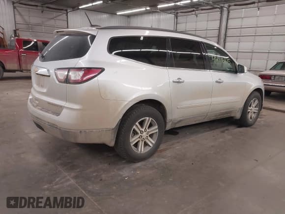 ✅ 2016 Chevrolet Traverse LT • VIN: 1GNKVGKDXGJ165682 • Lot: 42176875. Listed on IAAI with 240,342 mi. Free auction sales archive from the USA and detailed vehicle history report at DreamBid. Image 4.