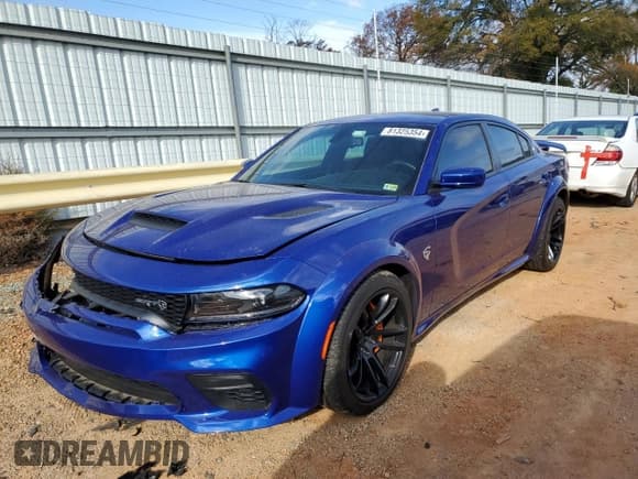 ✅ 2022 Dodge Charger SRT Hellcat Widebody • VIN: 2C3CDXL96NH134846 • Lot: 81325354. Listed on Copart with 19,774 mi. Free auction sales archive from the USA and detailed vehicle history report at DreamBid. Image 1.