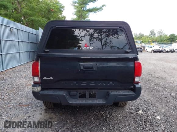 ✅ 2020 Toyota Tacoma SR • VIN: 3TYSX5ENXLT001202 • Lot: 42781126. Listed on IAAI with 250,016 mi. Free auction sales archive from the USA and detailed vehicle history report at DreamBid. Image 16.