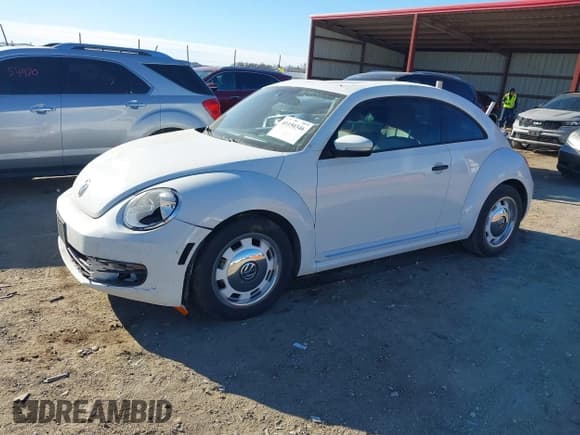 ✅ 2016 Volkswagen Beetle Wolfsburg Edition • VIN: 3VWF17AT0GM630596 • Lot: 41150346. Wystawiony na IAAI z przebiegiem 37 576 mil. Bezpłatny archiwum sprzedaży aukcyjnych z USA i szczegółowy raport historii pojazdu na DreamBid. Zdjęcie 2.