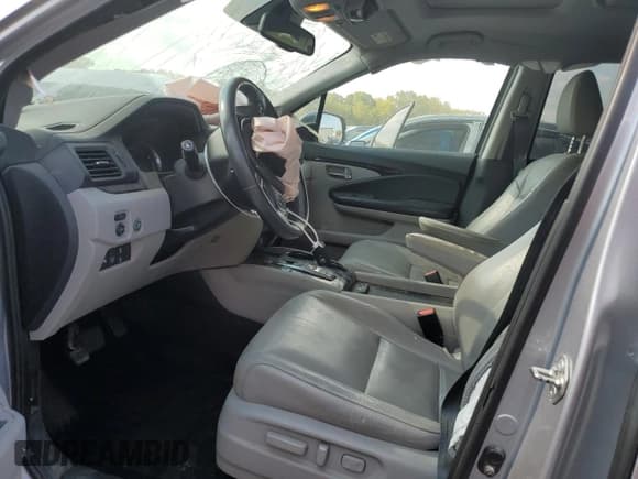 ✅ 2017 Honda Pilot Touring • VIN: 5FNYF6H94HB068161 • Lot: 80352505. Listed on Copart with 147,917 mi. Free auction sales archive from the USA and detailed vehicle history report at DreamBid. Image 7.