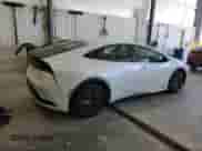 2024 Toyota Prius Limited with VIN JTDADABU9R3017082, listed as a Copart auction lot 85710085 with 9,983 mi miles and Salvage title. Bid and sale history available at DreamBid. Image 3.