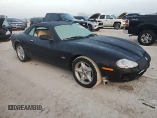 ✅ 1997 Jaguar XK • VIN: SAJGX2746VC005015 • Лот: 76176284. Опубликован ранее на Copart с пробегом Не указан. Бесплатный доступ к архиву аукционных продаж из США и подробный отчёт об истории автомобиля на DreamBid. Изображение 4.