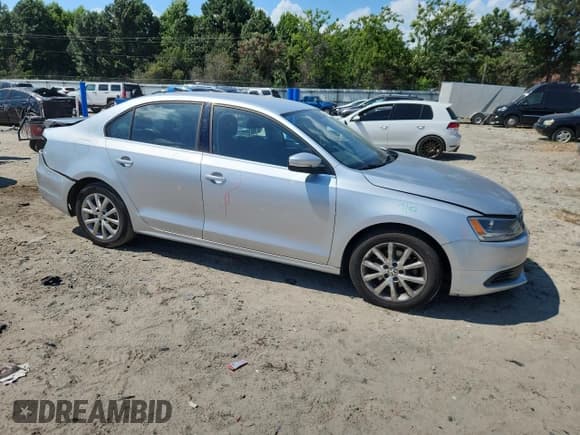 ✅ 2013 Volkswagen Jetta SE • VIN: 3VWDP7AJ1DM448244 • Lot: 61834375. Listed on Copart with 100,374 mi. Free auction sales archive from the USA and detailed vehicle history report at DreamBid. Image 4.