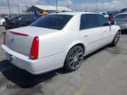 ✅ 2006 Cadillac DTS 1SC • VIN: 1G6KD57Y96U112581 • Лот: 41960024. Опубликован ранее на IAAI с пробегом 105 033 миль. Бесплатный доступ к архиву аукционных продаж из США и подробный отчёт об истории автомобиля на DreamBid. Изображение 4.