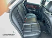 ✅ 2013 Jaguar XJ • VIN: SAJWJ1CD7D8V49599 • Lot: 96119395. Listed on Copart with 133,163 mi. Free auction sales archive from the USA and detailed vehicle history report at DreamBid. Image 6.