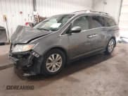 ✅ 2014 Honda Odyssey EX-L • VIN: 5FNRL5H66EB124173 • Lot: 43298894. Listed on IAAI with 154,548 mi. Free auction sales archive from the USA and detailed vehicle history report at DreamBid. Image 2.