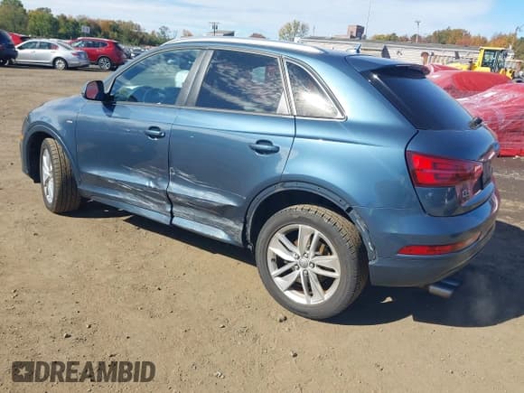 ✅ 2018 Audi Q3 Premium • VIN: WA1ECCFS7JR002472 • Lot: 43434394. Wystawiony na IAAI z przebiegiem 59 726 mil. Bezpłatny archiwum sprzedaży aukcyjnych z USA i szczegółowy raport historii pojazdu na DreamBid. Zdjęcie 3.