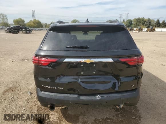 ✅ 2023 Chevrolet Traverse LT Cloth • VIN: 1GNEVGKW1PJ131631 • Lot: 84880415. Wystawiony na Copart z przebiegiem 69 568 mil. Bezpłatny archiwum sprzedaży aukcyjnych z USA i szczegółowy raport historii pojazdu na DreamBid. Zdjęcie 6.