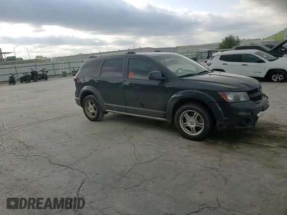 ✅ 2017 Dodge Journey Crossroad Plus • VIN: 3C4PDCGBXHT580528 • Lot: 52886895. Listed on Copart with 143,633 mi. Free auction sales archive from the USA and detailed vehicle history report at DreamBid. Image 12.