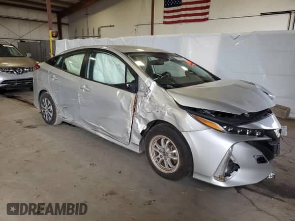 2021 Toyota Prius LE с VIN JTDKAMFP1M3181129, выставлен на аукционе Copart как лот 83845785 с пробегом 47 397 миль миль и Списание • Salvage title. История ставок и продаж доступна на DreamBid. Изображение 4.
