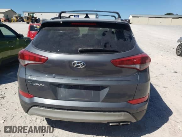 2018 Hyundai Tucson Limited z VIN KM8J33A28JU724148, wystawiony jako Copart lot #86606695 z przebiegiem 159 062 mil mil oraz Czysty tytuł • Clean title. Historia ofert i sprzedaży dostępna na DreamBid. Obrazek 6.