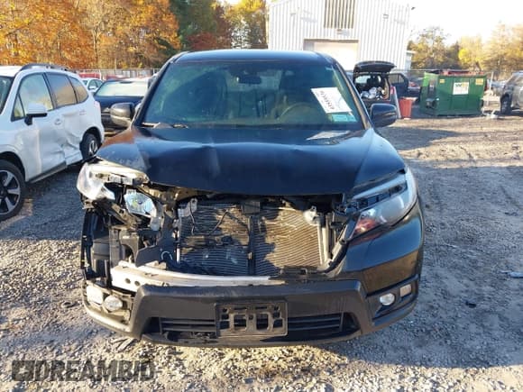 ✅ 2020 Honda Passport Sport • VIN: 5FNYF8H21LB014825 • Lot: 43555536. Listed on IAAI with 75,641 mi. Free auction sales archive from the USA and detailed vehicle history report at DreamBid. Image 12.