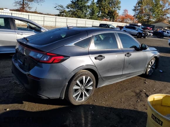 ✅ 2024 Honda Civic EX-L • VIN: 19XFL1H76RE014739 • Lot: 89539005. Listed on Copart with 26,677 mi. Free auction sales archive from the USA and detailed vehicle history report at DreamBid. Image 3.