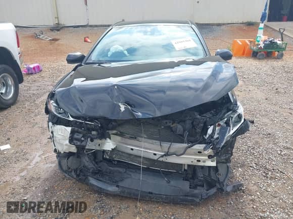 2021 Toyota Camry LE z VIN 4T1C11AK3MU543126, wystawiony jako IAAI lot #42989304 z przebiegiem 71 743 mil mil oraz . Historia ofert i sprzedaży dostępna na DreamBid. Obrazek 13.