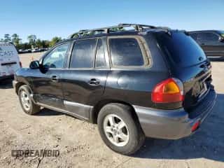 2003 Hyundai Santa Fe GLS z VIN KM8SC13D33U439982, wystawiony jako Copart lot #81414724 z przebiegiem 107 977 mil mil oraz Czysty tytuł • Clean title. Historia ofert i sprzedaży dostępna na DreamBid. Obrazek 2.