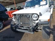 ✅ 2018 Jeep Wrangler Unlimited Sahara • VIN: 1C4HJXEG0JW321355 • Lot: 42343112. Listed on IAAI with 102,457 mi. Free auction sales archive from the USA and detailed vehicle history report at DreamBid. Image 19.