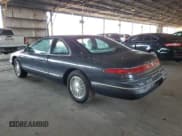 ✅ 1994 Lincoln Mark VIII • VIN: 1LNLM91V2RY638132 • Lot: 71309715. Listed on Copart with 67,615 mi. Free auction sales archive from the USA and detailed vehicle history report at DreamBid. Image 2.