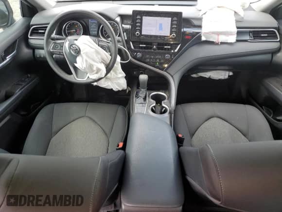 2023 Toyota Camry LE z VIN 4T1C11AK7PU151853, wystawiony jako Copart lot #81378565 z przebiegiem 19 510 mil mil oraz Czysty tytuł • Clean title. Historia ofert i sprzedaży dostępna na DreamBid. Obrazek 8.