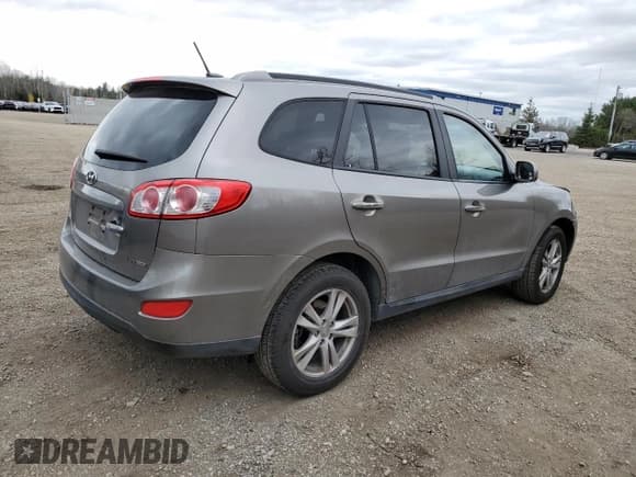 ✅ 2012 Hyundai Santa Fe Limited • VIN: 5XYZHDAG6CG149305 • Lot: 79016974. Listed on Copart with 268,224 mi. Free auction sales archive from the USA and detailed vehicle history report at DreamBid. Image 3.