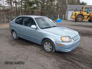 2005 Hyundai Accent GLS z VIN KMHCG35C85U354423, wystawiony jako IAAI lot #41939445 z przebiegiem 134 952 mil mil oraz . Historia ofert i sprzedaży dostępna na DreamBid. Obrazek 1.