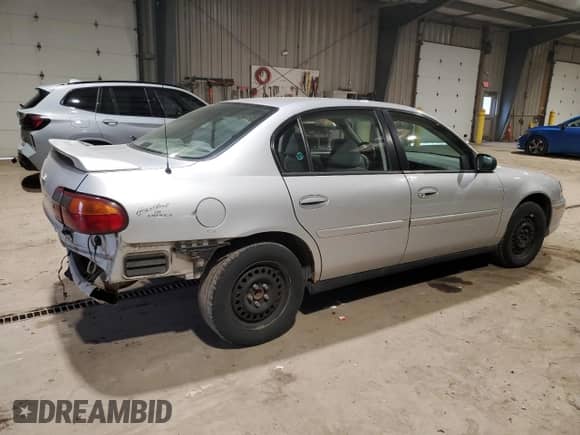 2003 Chevrolet Malibu with VIN 1G1ND52J03M726041, listed as a Copart auction lot 43620755 with 101,467 mi miles and Salvage title. Bid and sale history available at DreamBid. Image 3.