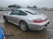 ✅ 2003 Porsche 911 • VIN: WP0AA29983S620988 • Лот: 49378715. Опубликован ранее на Copart с пробегом 99 291 миль. Бесплатный доступ к архиву аукционных продаж из США и подробный отчёт об истории автомобиля на DreamBid. Изображение 2.
