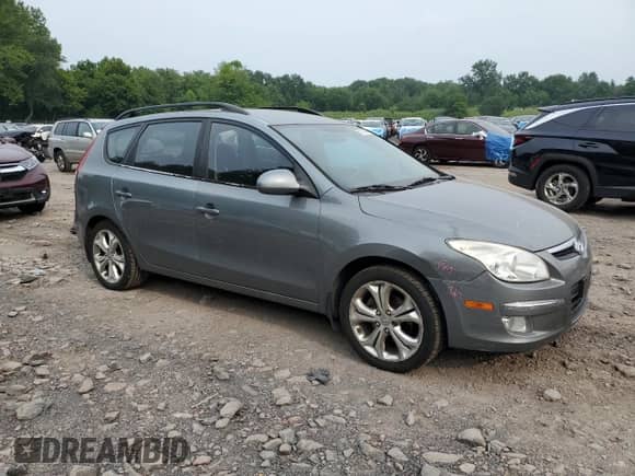 2010 Hyundai Elantra SE z VIN KMHDC8AE6AU059612, wystawiony jako Copart lot #67145645 z przebiegiem 162 561 mil mil oraz Szkoda całkowita • Salvage title. Historia ofert i sprzedaży dostępna na DreamBid. Obrazek 4.