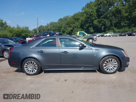 ✅ 2011 Cadillac CTS Premium • VIN: 1G6DS5EDXB0141278 • Лот: 42916147. Опубликован ранее на IAAI с пробегом 64 189 миль. Бесплатный доступ к архиву аукционных продаж из США и подробный отчёт об истории автомобиля на DreamBid. Изображение 13.