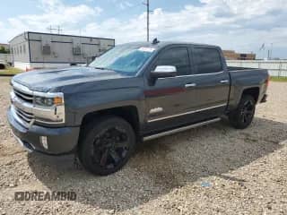 2018 Chevrolet Silverado 1500 High Country с VIN 3GCUKTEJ3JG108723, выставлен на аукционе Copart как лот 69251735 с пробегом 72 759 миль миль и Списание • Salvage title. История ставок и продаж доступна на DreamBid. Изображение 1.