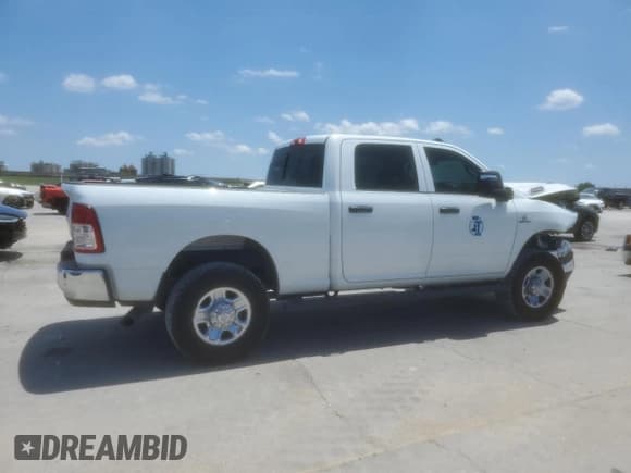 ✅ 2023 Ram 2500 Tradesman • VIN: 3C6UR5CL3PG636676 • Lot: 56949335. Listed on Copart with 61,984 mi. Free auction sales archive from the USA and detailed vehicle history report at DreamBid. Image 3.