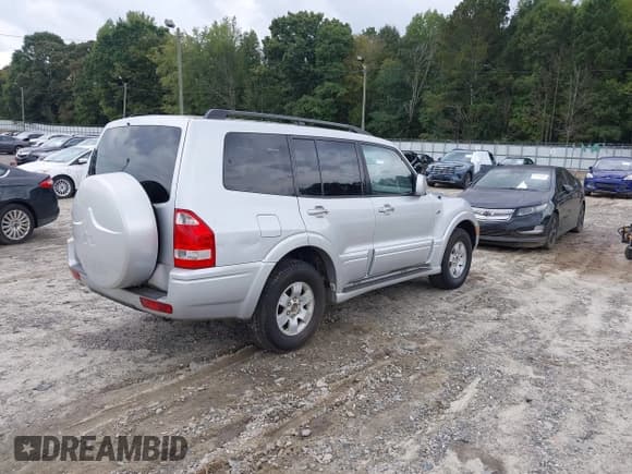 ✅ 2003 Mitsubishi Montero Limited • VIN: JA4NW51S53J037166 • Lot: 43302034. Listed on IAAI with 145,965 mi. Free auction sales archive from the USA and detailed vehicle history report at DreamBid. Image 4.