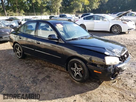 2001 Hyundai Elantra GLS z VIN KMHDN45D01U137872, wystawiony jako Copart lot #74987874 z przebiegiem 151 353 mil mil oraz Szkoda całkowita • Salvage title. Historia ofert i sprzedaży dostępna na DreamBid. Obrazek 4.