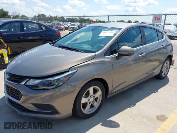 2017 Chevrolet Cruze LT with VIN 3G1BE6SMXHS587737, listed as a IAAI auction lot 43127981 with 134,419 mi miles and . Bid and sale history available at DreamBid. Image 2.