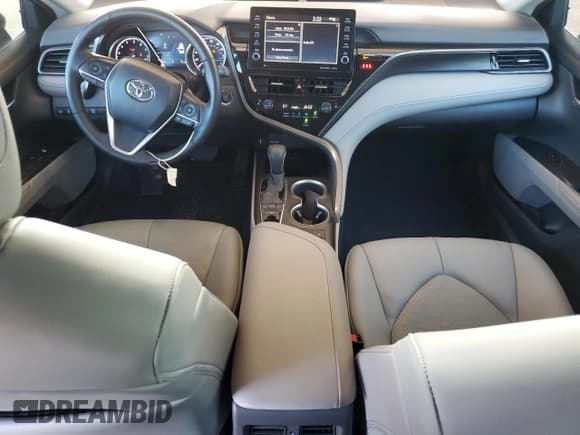 ✅ 2022 Toyota Camry XLE • VIN: 4T1F11AK7NU011392 • Лот: 86472165. Опубликован ранее на Copart с пробегом 21 000 миль. Бесплатный доступ к архиву аукционных продаж из США и подробный отчёт об истории автомобиля на DreamBid. Изображение 8.