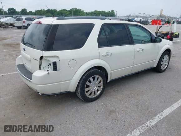 ✅ 2009 Ford Taurus X Limited • VIN: 1FMDK03W29GA02957 • Lot: 42370198. Listed on IAAI with 196,068 mi. Free auction sales archive from the USA and detailed vehicle history report at DreamBid. Image 4.