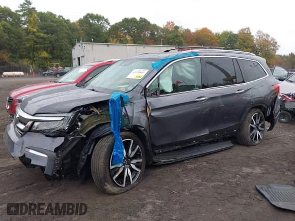 ✅ 2022 Honda Pilot Touring 8-Passenger • VIN: 5FNYF6H93NB001336 • Lot: 43370691. Listed on IAAI with 39,984 mi. Free auction sales archive from the USA and detailed vehicle history report at DreamBid. Image 17.