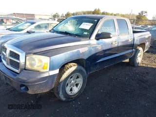 ✅ 2007 Dodge Dakota SLT • VIN: 1D7HE48K67S107608 • Lot: 43728265. Listed on IAAI with 270,878 mi. Free auction sales archive from the USA and detailed vehicle history report at DreamBid. Image 2.