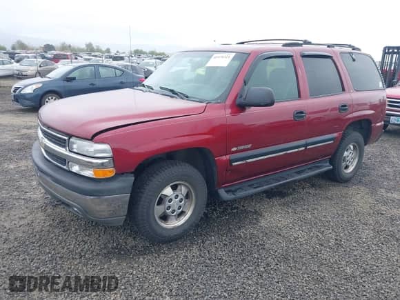 2001 Chevrolet Tahoe LT with VIN 1GNEK13T51R217446, listed as a IAAI auction lot 41970321 with 196,766 mi miles and . Bid and sale history available at DreamBid. Image 2.